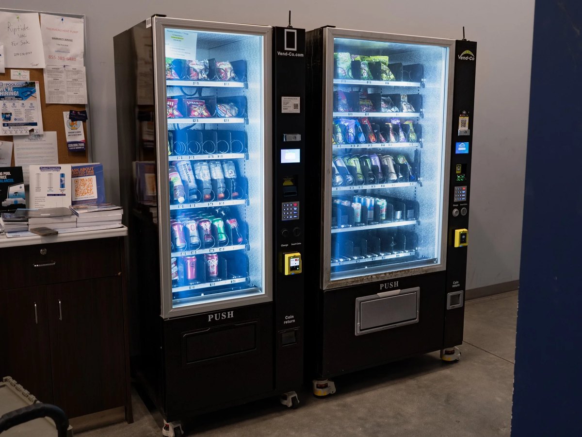 Two vending machines selling snacks and drinks.